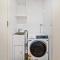 Central, modern 1 bedroom with air-con & balcony