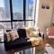 Sky-High 2BR Retreat near Crown with Free Parking
