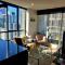 Sky-High 2BR Retreat near Crown with Free Parking