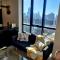 Sky-High 2BR Retreat near Crown with Free Parking