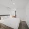 Sleek 2-Bed Apartment with Rooftop Garden Access