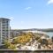 Sleek 2-Bed Apartment with Rooftop Garden Access