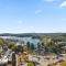 Sleek 2-Bed Apartment with Rooftop Garden Access