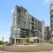 Sleek 2-Bed Apartment with Rooftop Garden Access