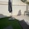 Beach bungalow with swiming pool and long terrace