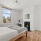 Lovely 4 Bedroom London Home with Free Parking, Garden, WiFi By Roost Accommodation