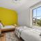 Lovely 4 Bedroom London Home with Free Parking, Garden, WiFi By Roost Accommodation