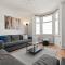 Lovely 4 Bedroom London Home with Free Parking, Garden, WiFi By Roost Accommodation