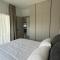 ΘΕΑ 5 Comfortable 1BR and 2BR Apartments