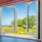 Polrunny Farm Seaberry Cottage with a sea view and log burner