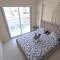 Stylish 2BR Apartment with Balcony, Wifi & Pool