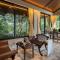 Nivaant Farms by StayVista - Green Retreat with Pool, Orchard, Jacuzzi & Gazebo