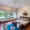 Nivaant Farms & Cottages - Nestled in lush greenery, offering a Swimming pool, Orchard, Jacuzzi & A spacious lawn with gazebo