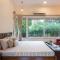 Nivaant Farms & Cottages - Nestled in lush greenery, offering a Swimming pool, Orchard, Jacuzzi & A spacious lawn with gazebo