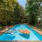 Nivaant Farms & Cottages - Nestled in lush greenery, offering a Swimming pool, Orchard, Jacuzzi & A spacious lawn with gazebo