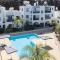 Paphos blue tasteful apartment Complex pool view