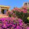 Eva Gardens corner house with stunning garden and huge swimming pool next to CORAL BAY