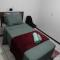 Quarto em casa de família