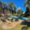 House with large garden and pool