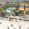 Beachfront - Garden Delight 2BR condo - E125-2
