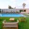 Rooftop Sunset Garden by Staycom