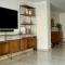Beachfront apartment with 2 Workspaces, Kids Room & Pool
