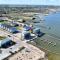Waterfront Escape w Views Shared Pool Boat Dock Orange Crush by AvantStay