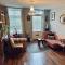 Quirky town centre apartment with river terrace