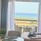 Tranquil Suites By the Sea