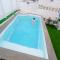 Big Villa Puerto Rico streetfront with private saltwater jacuzzi pool, BBQ, kitchen & 3 terraces near shopping center
