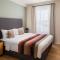 Escala Hotel & Suites