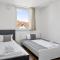 EXQUIS 2BR Luxus Apartment ROLF BENZ I Parken I Netflix I Stadtmitte I Familienfreundlich I Mercedes-Benz
