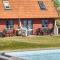5 person holiday home on a holiday park in Gudhjem