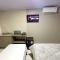 Loft Lux 4 Centro (Smart TV, ar-condicionado e cozinha completa)