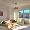Cozy Apartment Steps from Sandy Beach