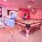 That Pink Disco House By The Cohost Company