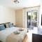 Mediterranean Escape - Steps from the Beach Apartment with Pool