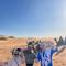 Enjoy Moda Camp Merzouga tours- Camel sunset sunrise Quad Sunboarding ATV