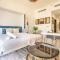 Studio Near Dubai Butterfly Garden, 18 Mins Drive From Mall of Emirates, Miraclz Tower, Arjan By Deluxe Holiday Homes