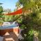 Poz Lagon - chambre dhôtes - Bungalow pour 2 personnes - Jacuzzi privatif - petit déjeuner - Vue sur le lagon