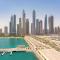VayK - Stunning 2BR in Emaar Beachfront with Beach Access