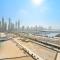 VayK - Stunning 2BR in Emaar Beachfront with Beach Access