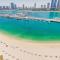 VayK - Stunning 2BR in Emaar Beachfront with Beach Access