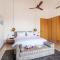 StayVistas Villa 107 at Canary Farms - Pure Veg with Huge Lawn, Pool and Home Theatre