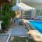Lovely Villa 5- bedroom with Overflow Pool with Nice Garden at Green Oasis Resort