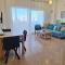 Queens Gardens suite by the sea, pool and mall