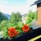 Ferienwohnung Laax mit Traumblick, großem Balkon und Terrasse