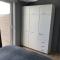 Apartment by Zeedijk with Spacious Terrace, cleaning included