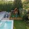 FREE Breakfast, Villa Dreamcatcher with Outdoor and Indoor Pool, Hot Tub, Playroom and Home Cinema