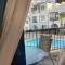 Paphos blue tasteful apartment Complex pool view